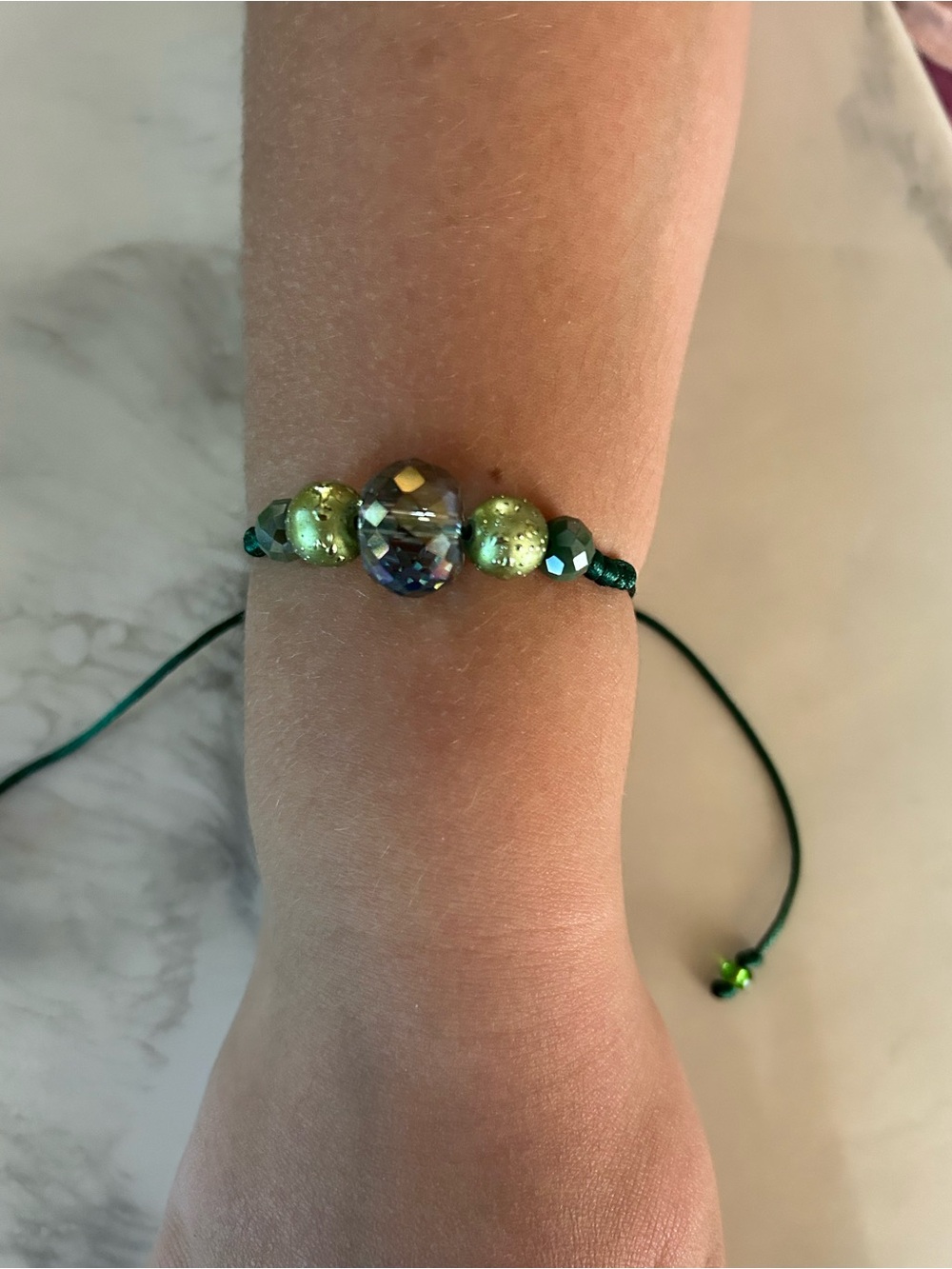 Green Beaded Adjustable Bracelet with Iridescent Center